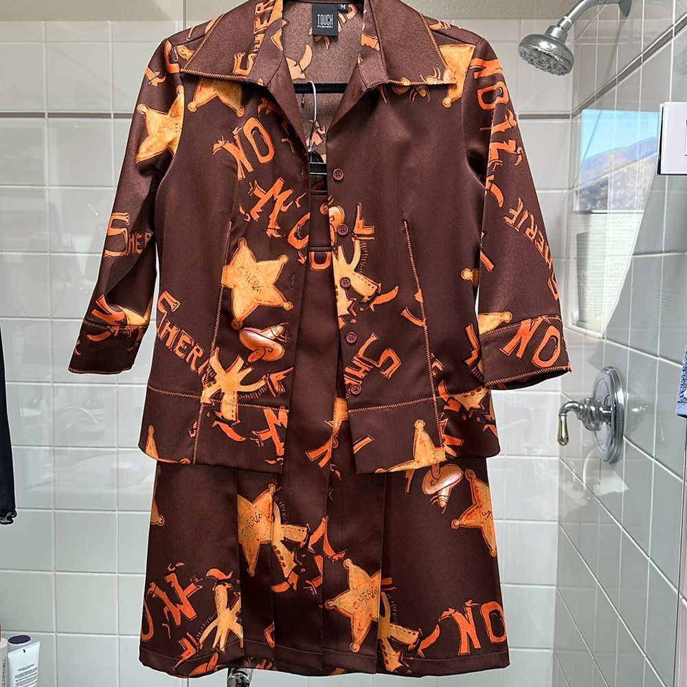 Funky western suit. Pleated skirt & cropped jacket.